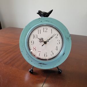 Blue Clock with Black Bird